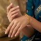 SJJGB106 | Tiny Twist Elegant Gold Bangle with Modern Minimal Appeal