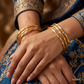 SJJGB109 | Twined Grace Twisted Gold Bangle with Elegant Contemporary Style
