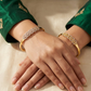SJJGB111 | Interwoven Grace Designer Gold Bangle with Artistic Detailing