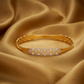 SJJGB111 | Interwoven Grace Designer Gold Bangle with Artistic Detailing