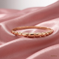 SJJGB118 | Chic Fluidity Rose Gold Bangle with Contemporary Curved Design