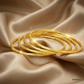 SJJGB132 | Dainty Spiral Gold Bangle with Minimalist Modern Appeal