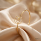 SJJGB145 | Interwoven Elegance Designer Gold Bangle with Artistic Finish
