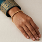 SJJGB146 | Playful Flick Stylish Gold Bangle with Contemporary Appeal