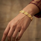 SJJGB150 | Glam Wave Contemporary Gold Bangle with Stylish Curved Design