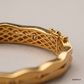 SJJGB159 | Wave Lattice Contemporary Gold Bangle with Openwork Design