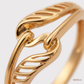 SJJGR132 | Fluid Interplay Contemporary Gold Ring with Artistic Curved Design