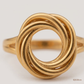 SJJGR151 | Twist Orbit Stylish Gold Ring with Artistic Circular Design